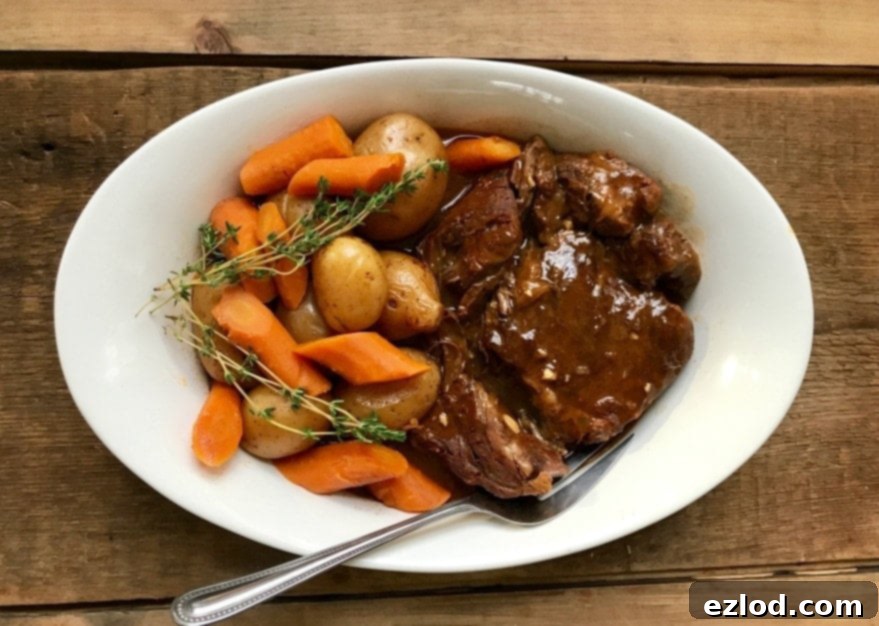 Close-up of a delicious Instant Pot Beef Pot Roast with gravy and vegetables