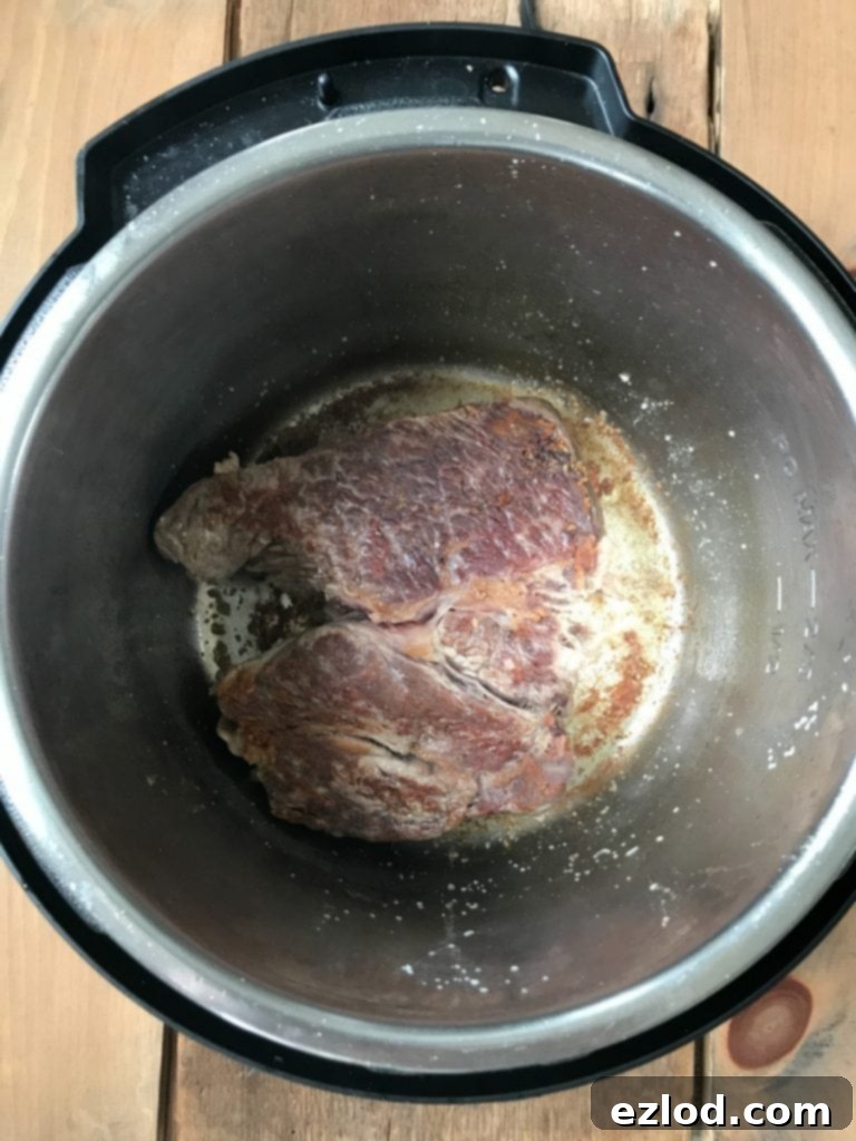 Ingredients for Instant Pot Pot Roast: chuck roast, onions, garlic, carrots, potatoes