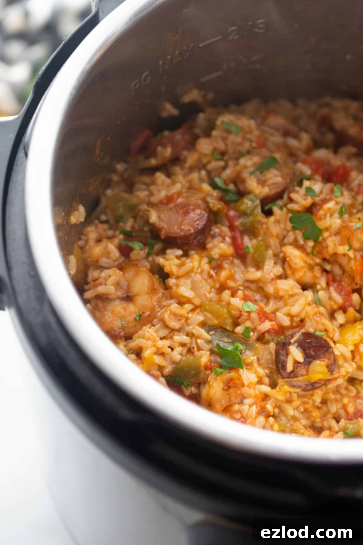 Jambalaya cooked to perfection, simmering in an Instant Pot.