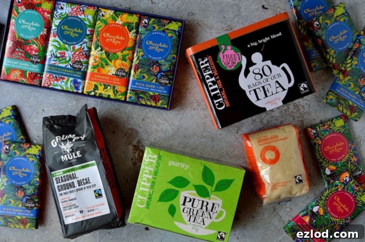 Selection of Fairtrade certified products including chocolate, tea, and coffee
