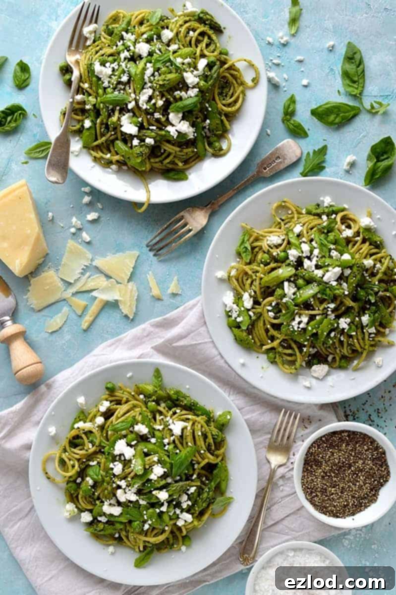 Spaghetti with lemon rocket and walnut pesto, asparagus, peas and goats cheese - quick, easy and perfect for Spring!