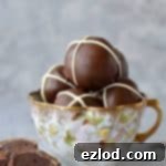 Spiced Hot Cross Bun Truffles 5 Hot cross bun chocolate truffles - rich, decadent chocolate ganache truffles flavoured with spices and mixed dried fruit, topped with a white chocolate cross.