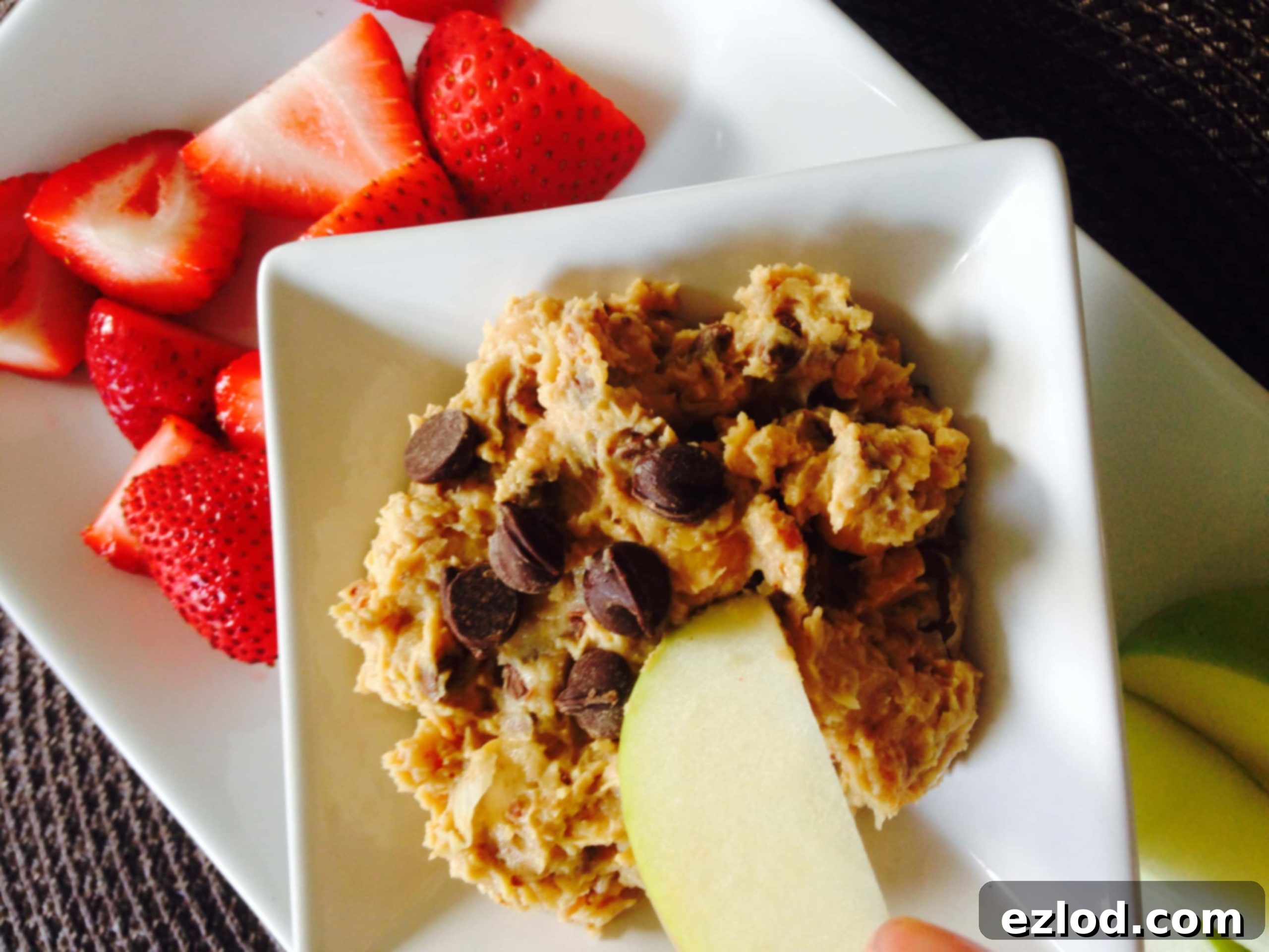 A promotional image for cookie hummus dip, emphasizing it as a 21 Day Fix approved healthy treat from ConfessionsOfAFitFoodie.com.
