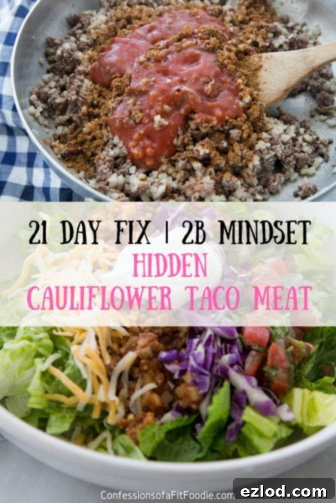 A close-up of a taco filled with Hidden Cauliflower Taco Meat and various fresh toppings.