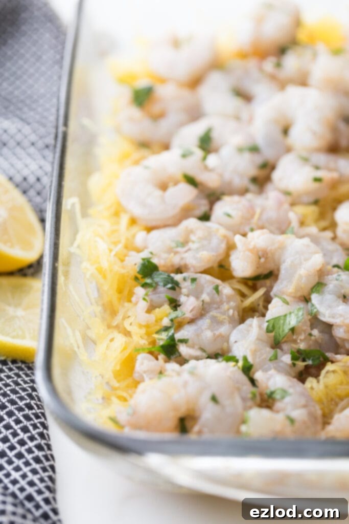 shrimp scampi ingredients in glass casserole dish