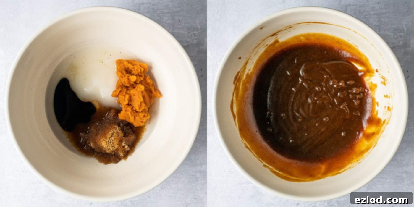 Step 2 in making vegan pumpkin chocolate chip cookies: A hand is actively whisking together the wet ingredients in a bowl. This includes melted coconut oil, various sugars, pumpkin puree, treacle, and vanilla extract, ensuring a smooth and homogenous mixture.