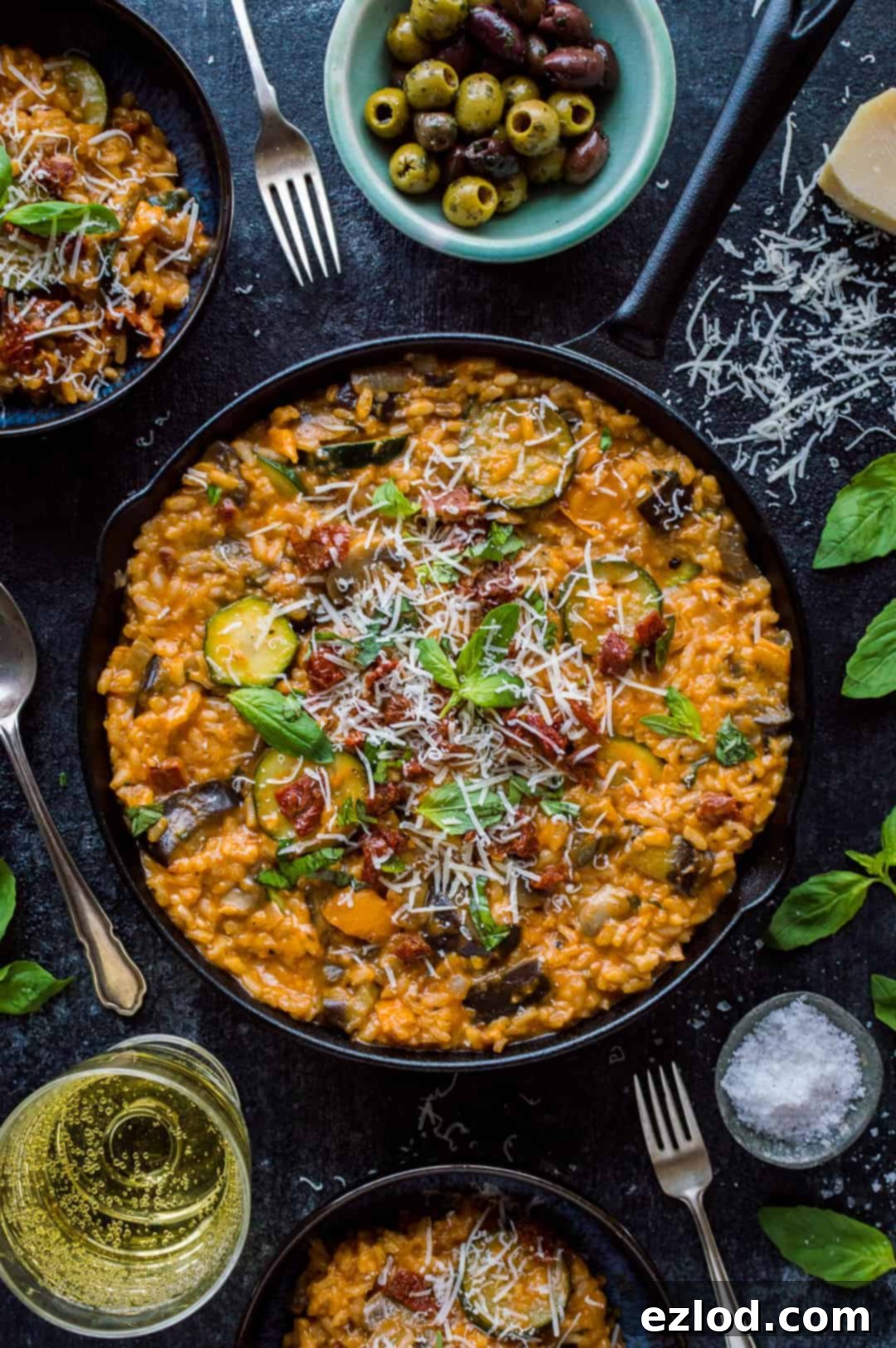 Ratatouille risotto - a creamy, flavourful vegetarian risotto filled with ratatouille vegetables, herbs, sundried tomatoes and veggie parmesan.