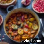 Vegan vegetable tagine filled with aubergine, courgette, carrot, butternut squash and peppers
