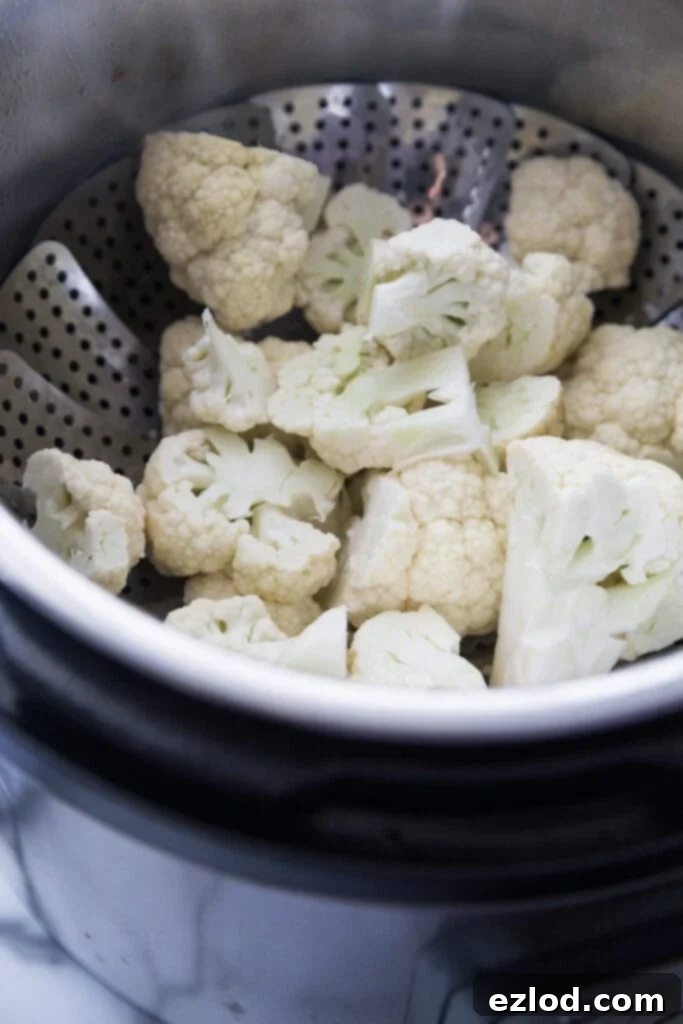 A photo showing how to steam cauliflower for cauliflower mash in the instant pot