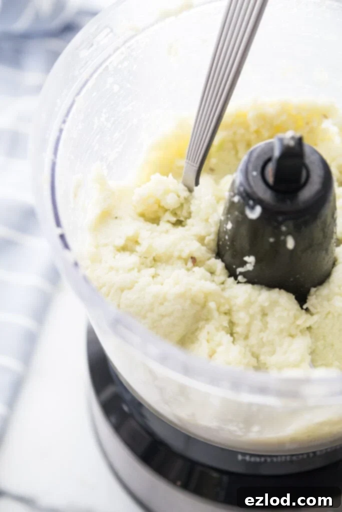 A photo of cauliflower mash in a food processor 