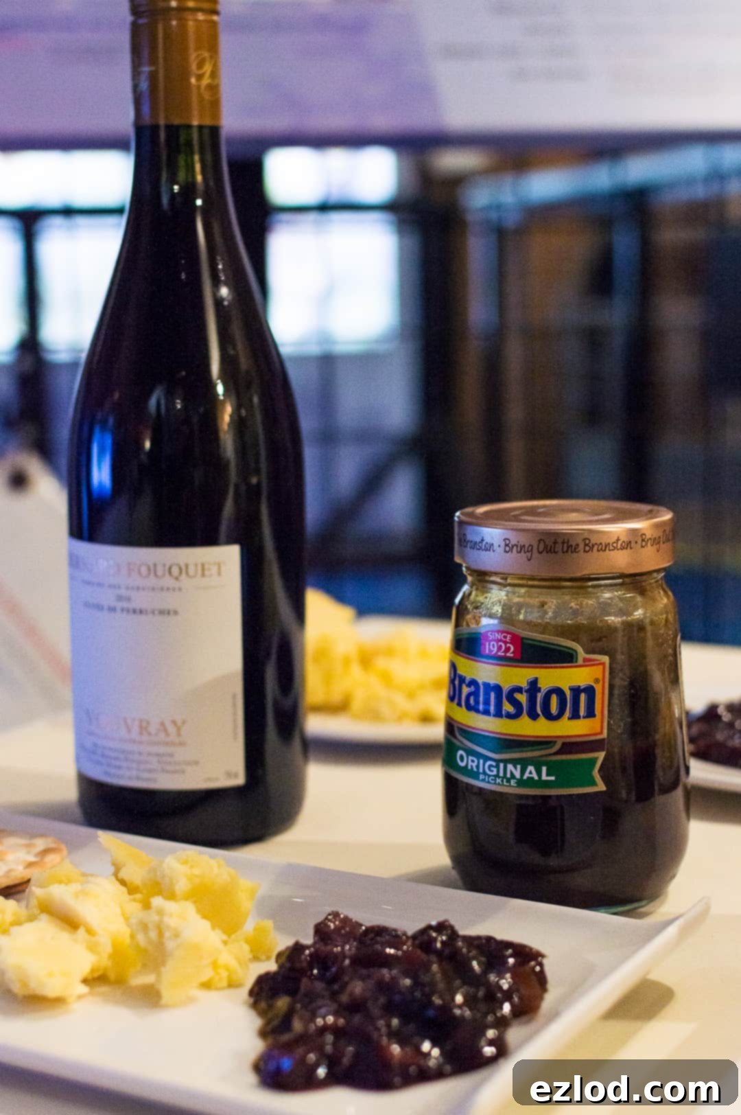 Lancashire cheese, a glass of Vouvray, and a jar of Branston Original pickle