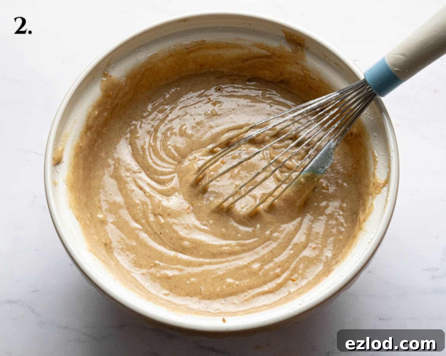 Step 2: Wet and dry ingredients combined to form the cake batter.