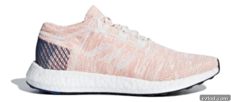 Close-up of adidas Pureboost Go sneakers, highlighting their design and comfort features.