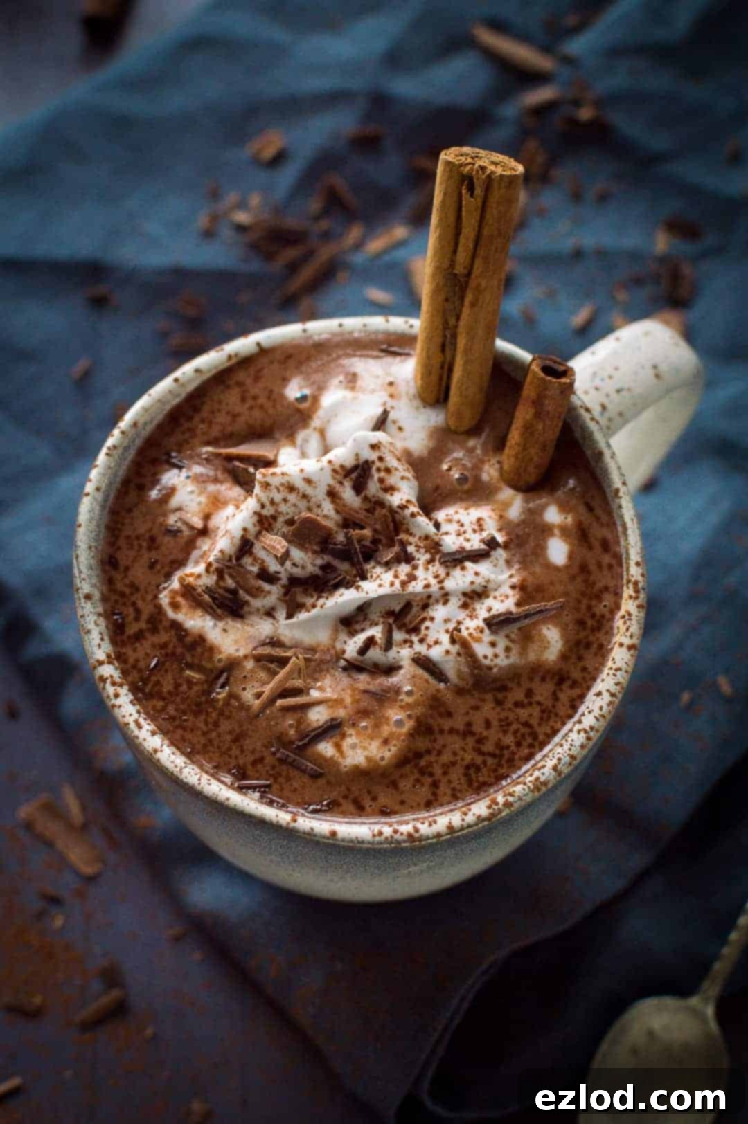 Thick, creamy vegan gingerbread hot chocolate - rich and lusciously thick vegan hot chocolate with gingerbread spices. Made with cashews, sweetened with dates; refined sugar free.