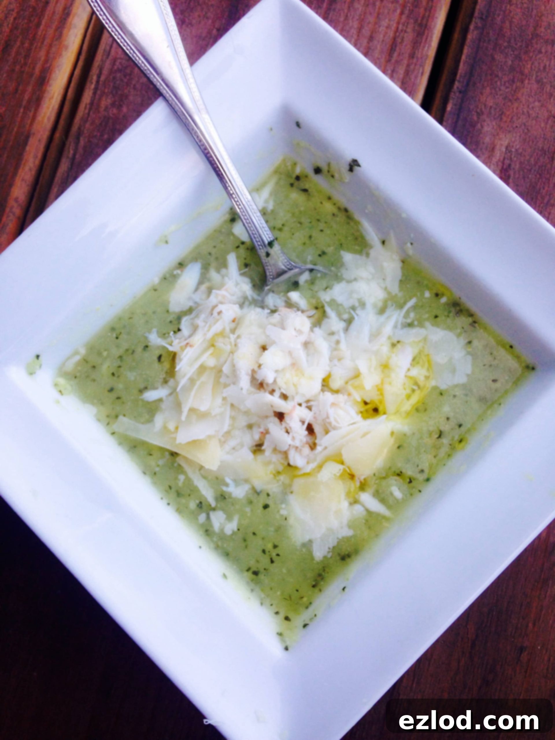 A close-up of creamy Zucchini Crab Soup in a bowl, ready to be enjoyed.