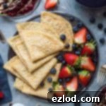 Decadent Vegan Crepes with Berry Compote and Rich Chocolate 4 Vegan crepes with berry compote and chocolate sauce - easy, tender, egg and dairy free pancakes with a delectable chocolate sauce and mixed berry compote. Perfect for pancake day!