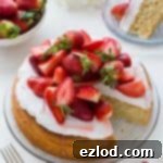 Luscious Vegan Lemon Almond Cake with Coconut Whipped Cream and Macerated Strawberries 6 Vegan lemon almond cake with coconut whipped cream and macerated strawberries - a light, moist vegan lemon and almond cake topped with a cloud of coconut whipped cream and sweet macerated strawberries. The perfect cake for Spring!