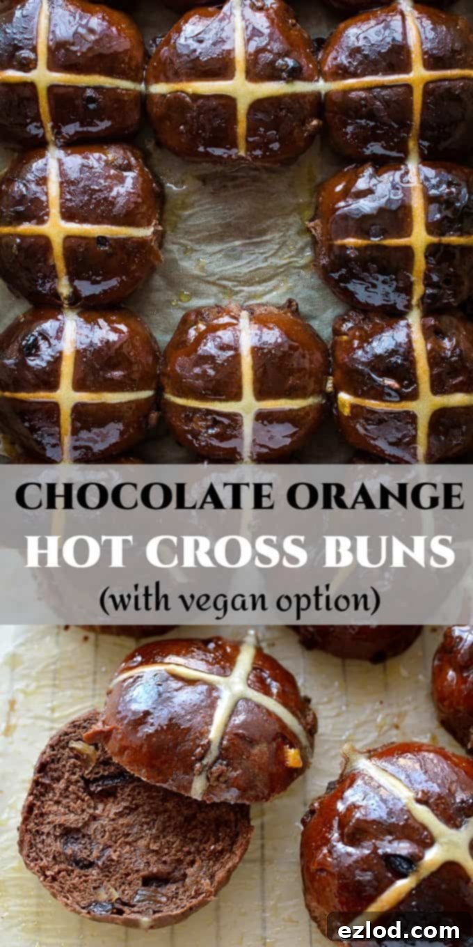 A vibrant Pinterest image featuring several Chocolate Orange Hot Cross Buns, garnished with a glossy glaze and white crosses, with text highlighting the recipe as a delectable, vegan-friendly Easter treat.