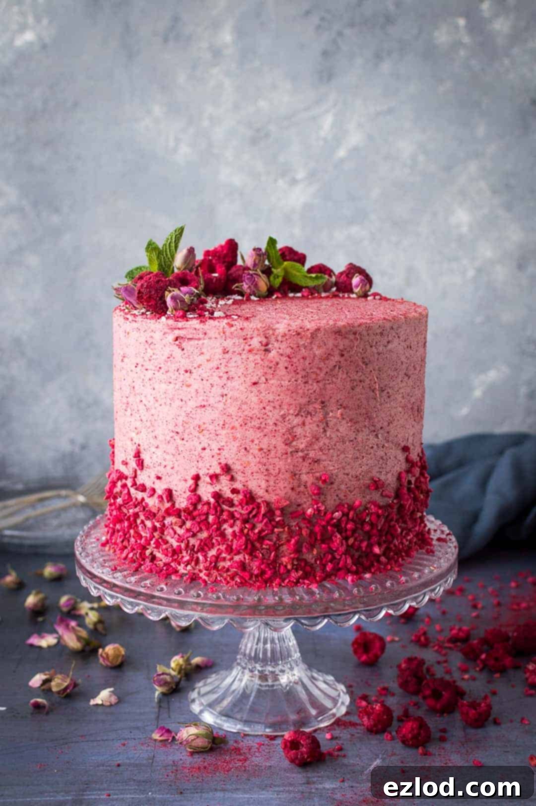 Raspberry, coconut and lemon layer cake - a gorgeous cake for Spring with coconut cake layers, raspberry buttercream and lemon curd. 