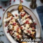 Hearty Chickpea and Lentil Stuffed Aubergines 5 Chickpea and lentil stuffed aubergines – a tasty, healthy vegetarian meal that looks impressive but is really easy to make!