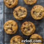 Vegan chocolate chip cookies - crispy round the edges, chewy in the middle, loaded with chocolate chips and really easy to make; these cookies will become your new favourite recipe!