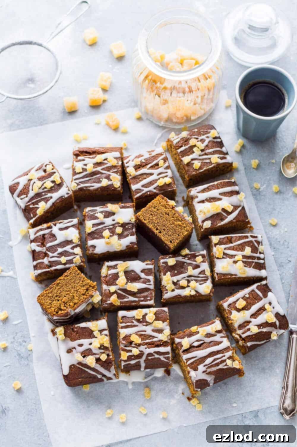 A beautifully presented vegan ginger cake, moist, sticky, and spicy, perfect for a treat.