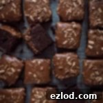 Vegan chocolate sheet cake - a soft, moist, delicious chocolate traybake cake topped with rich, smooth vegan chocolate coconut milk ganache. Perfect for feeding a crowd! #vegan #chocolatecake #sheetcake #birthdaycake #baking