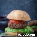 Savoury umami vegan mushroom lentil burgers served in buns with fresh toppings, packed with veggies and protein for a healthier, satisfying meal. Perfect for an everyday dinner or a BBQ.