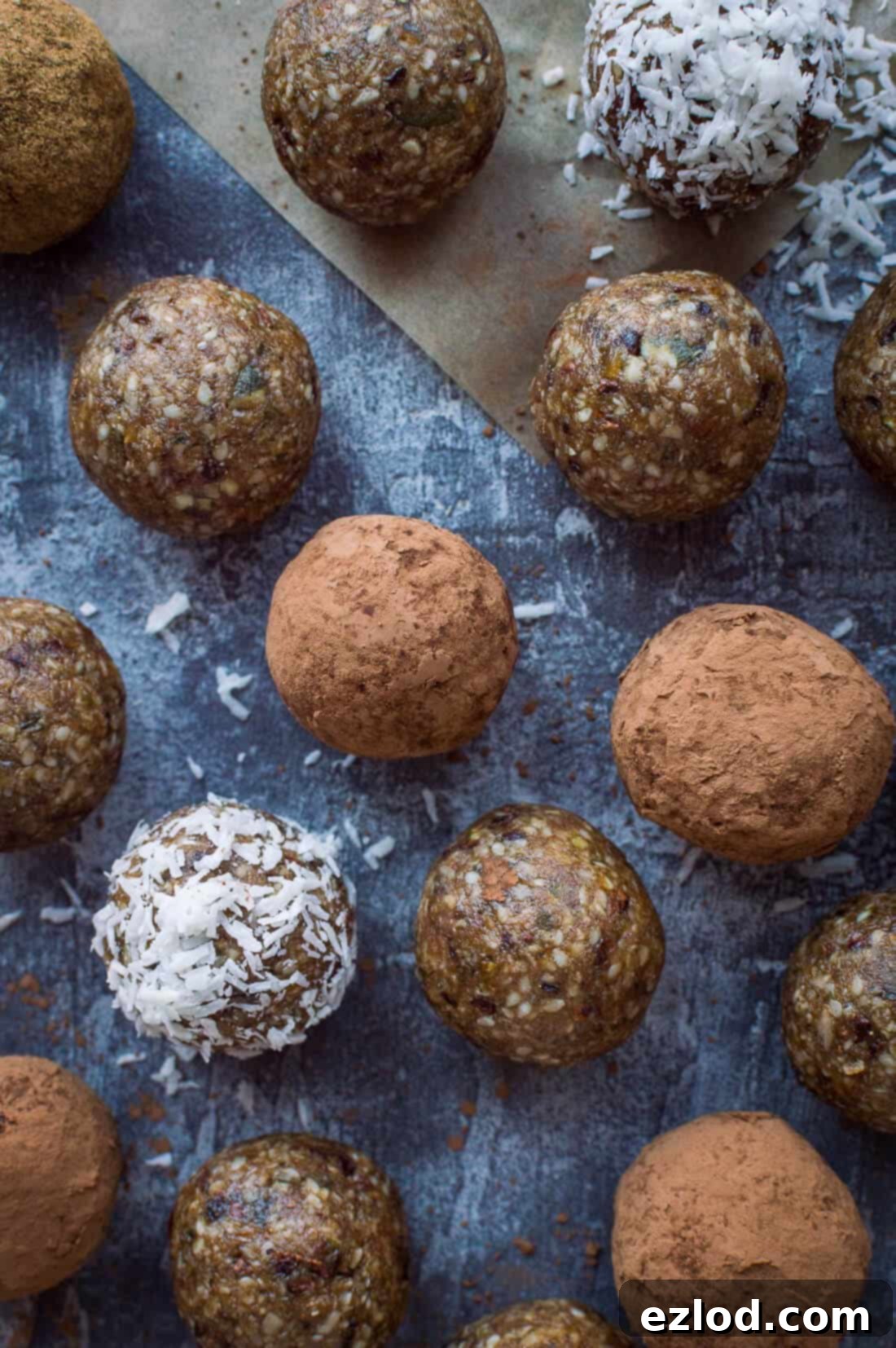 Energy bites made with seeds, cacao nibs, dried fruit, coconut, peanut butter and maple syrup.