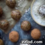 Healthy vegan protein bites rolled in cacao powder and coconut.
