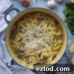 One pot mushroom pasta - a quick, easy to make creamy vegan mushroom spaghetti recipe that is all cooked in one pot. Perfect for a quick weeknight dinner, camping, or just for saving on washing up! #vegan #onepotpasta #veganpasta #mushrooms #easymeal