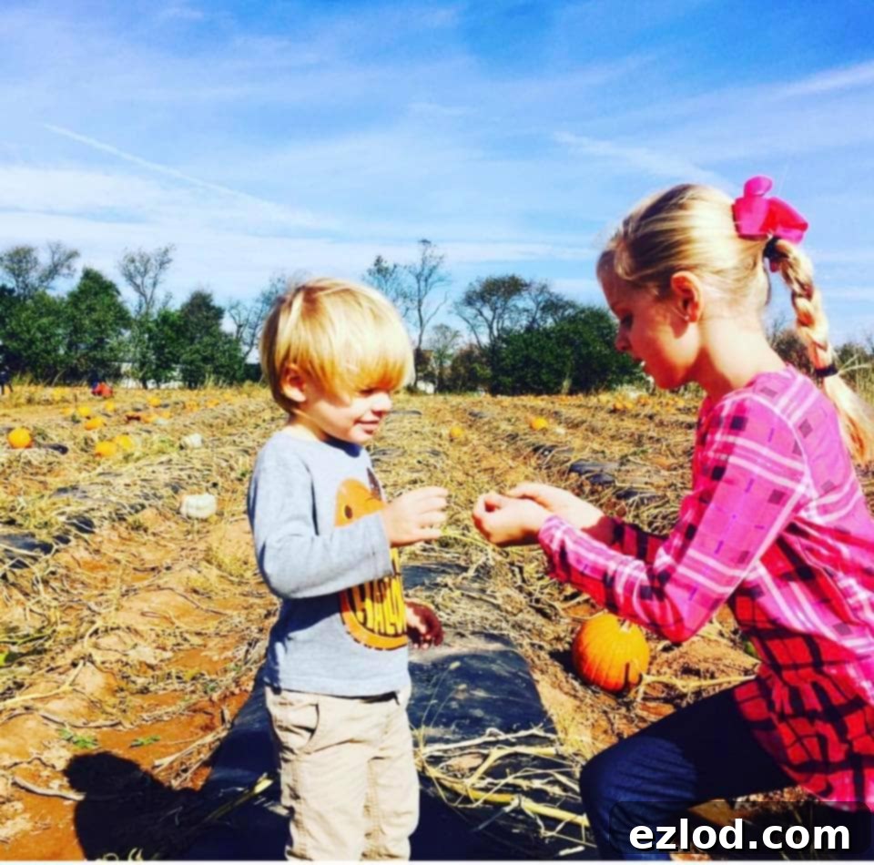 Mia and Max engaging in an activity, a testament to Mia's persistent efforts and Max's growing connection.