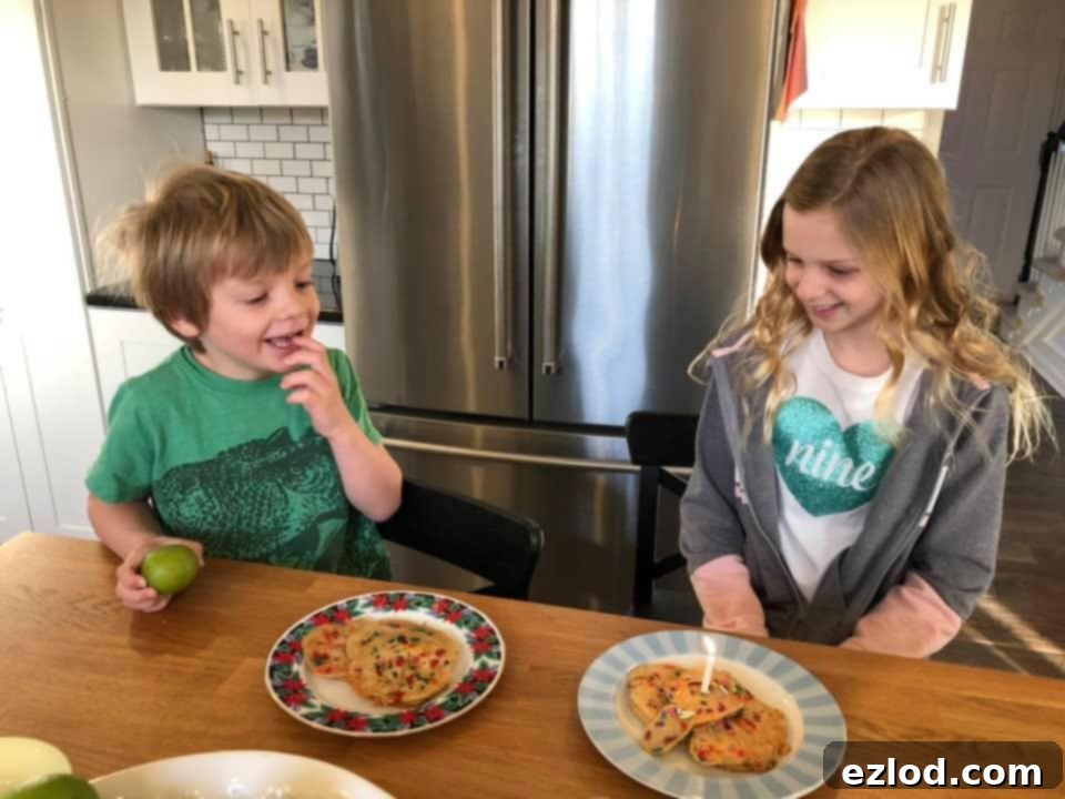 Mia and Max together, sharing a quiet moment, illustrating their close sibling bond.