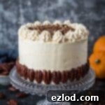 Spiced Vegan Pumpkin Cake with Toasted Maple Pecans and Creamy Cinnamon Buttercream 9 Vegan pumpkin cake with maple pecans and cinnamon buttercream - this easy to make, fluffy, moist and perfectly spiced cake is perfect for Autumn; you would never guess that it's vegan! #vegan #pumpkinspice #layercake