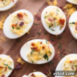 Deviled Eggs with Bacon, Cheddar, and Chives