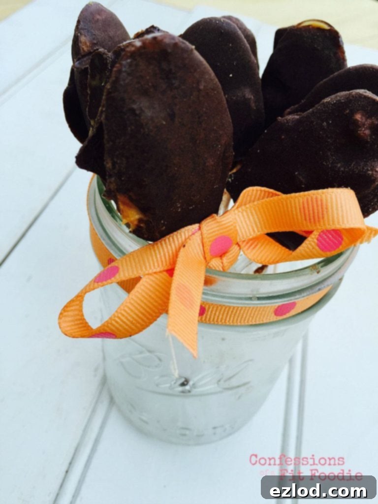 Frozen chocolate peanut butter on a spoon is the ultimate frozen treat for anyone on the 21 Day Fix! Tastes like a frozen peanut butter cup! Recipe on ConfessionsOfAFitFoodie.com