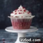 Vegan red velvet cupcakes - moist, fluffy, easy to make chocolate and vanilla cupcakes with tangy vegan cream cheese frosting. #vegan #cupcakes #redvelvet