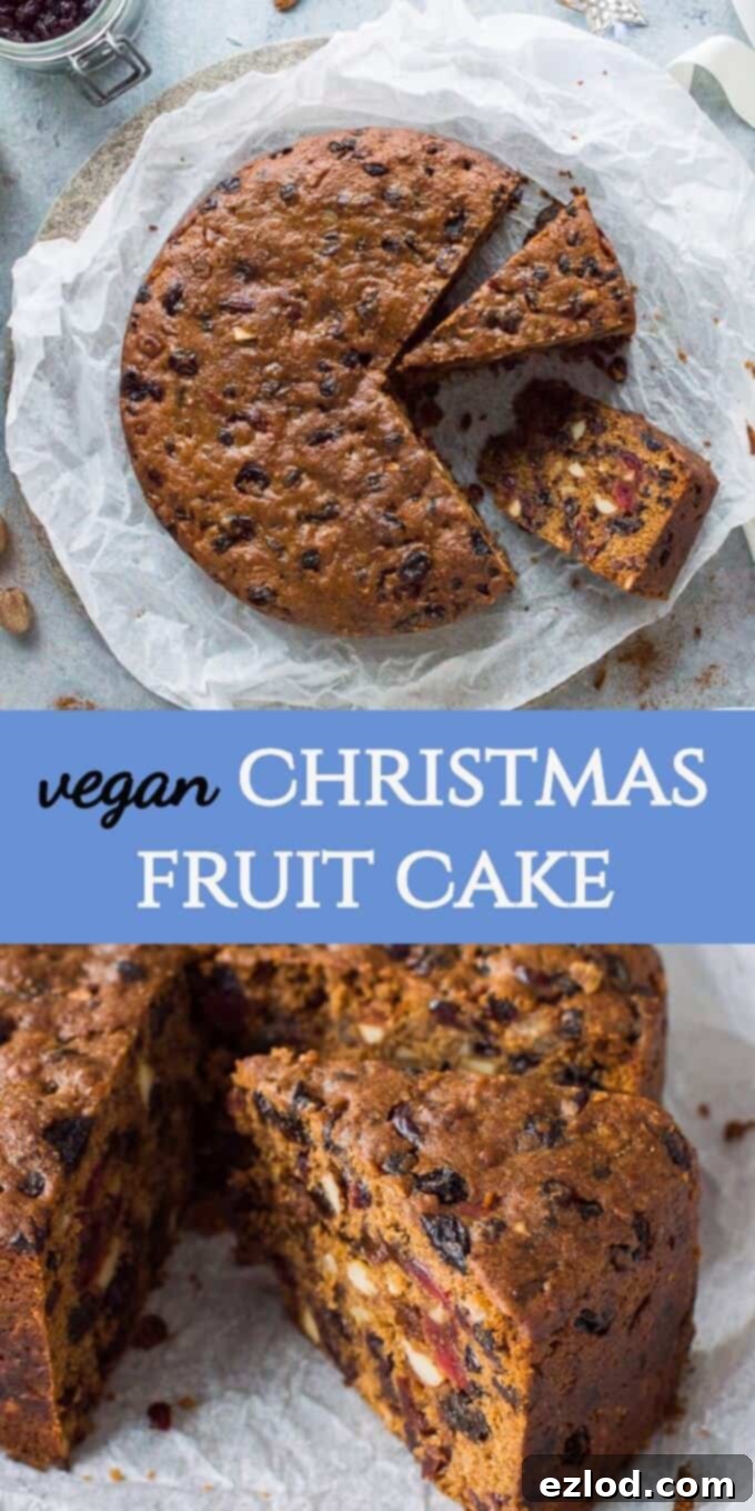 Vegan Christmas cake - a rich, moist and boozy vegan fruit cake that is perfect for the festive season. Eat right away or make in advance and feed regularly with rum or brandy. #vegan #christmas #vegancake #veganbaking #veganchristmas #fruitcake A final beautiful image of the whole vegan Christmas cake, perfectly baked and ready for festive celebrations, possibly adorned with simple decorations.