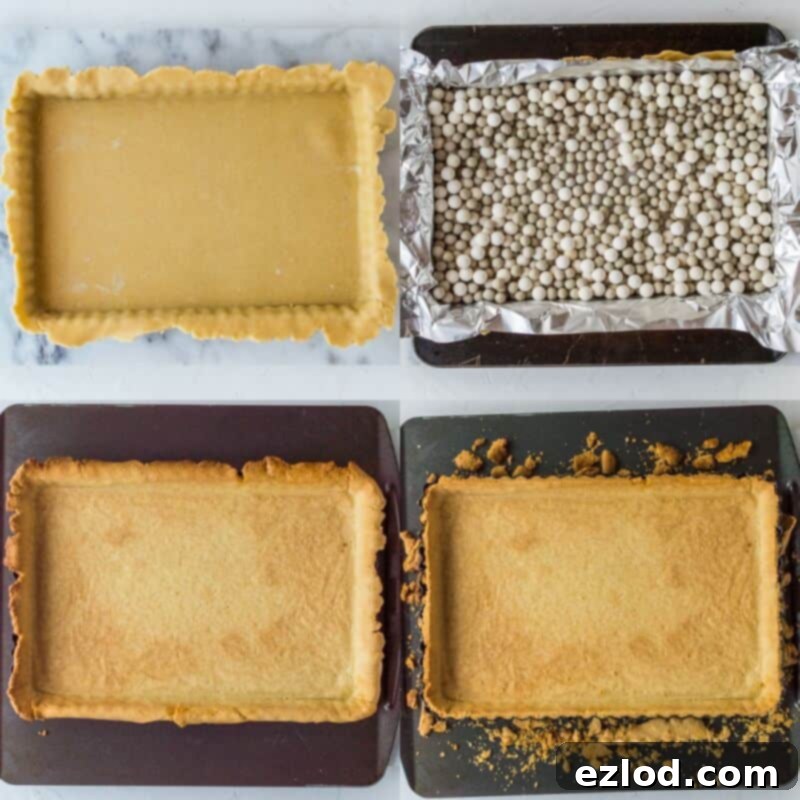 Step-by-step image capturing the blind baking of the pastry for the starry mince pie tart. The tart tin is lined with foil and baking beans, ensuring a perfectly crisp base before filling.