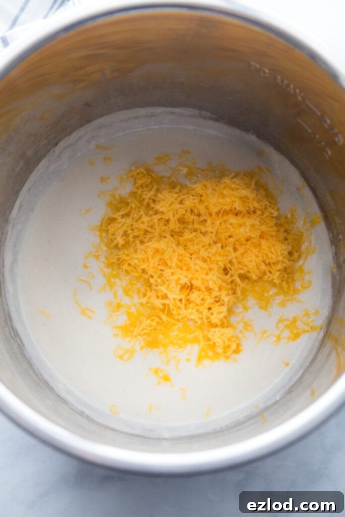 The process of making cheese sauce in the Instant Pot, showing butter melting and flour being whisked in.