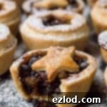 Vegan mince pies - a vegan version of the popular Christmas treat with boozy, easy to make home-made mincemeat and crisp coconut oil pastry. #Christmas #baking #vegan
