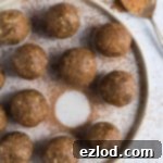 A small, inviting image of Chocolate Chip Peanut Butter Energy Bites, perfect for a quick snack or pre-workout fuel. These healthy, protein-packed vegan balls taste like cookie dough and are ready in 10 minutes.