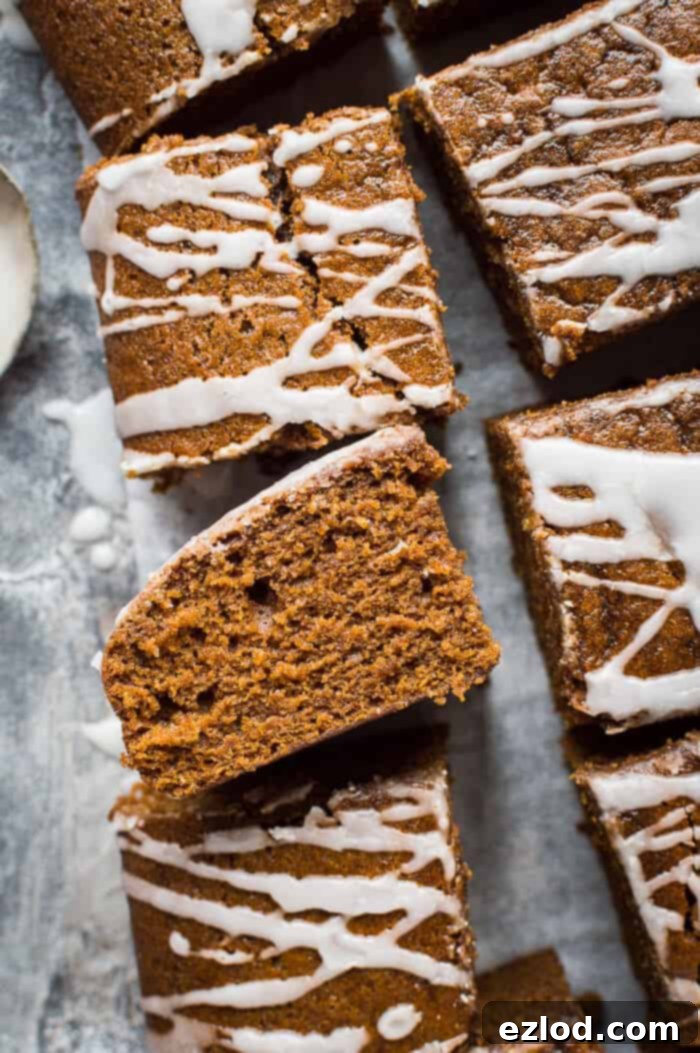 close up of a slice of vegan ginger sheet cake with lemon glaze