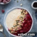 PB&J porridge - creamy vegan peanut butter porridge topped with tangy raspberry compote. This oatmeal is quick and easy to make and a healthy way to keep you full until lunchtime. #vegan #breakfast #healthy