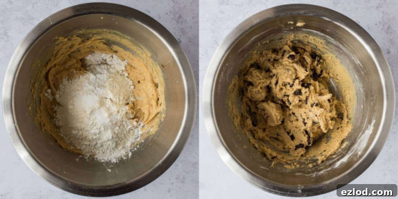 Step 2 in making vegan peanut butter chocolate chip cookies: combining all the dry ingredients including flour, baking powder, and cornflour, then stirring in chopped dark chocolate into the creamy dough.