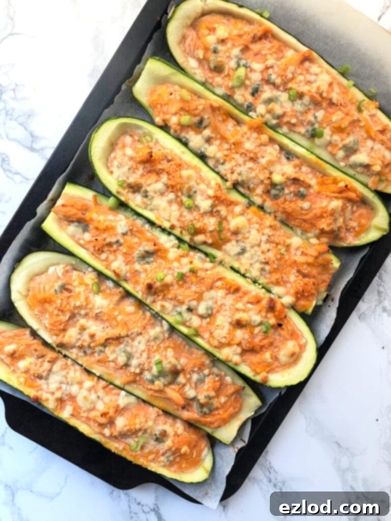 A delicious looking tray of Low Carb Buffalo Stuffed Zucchini Boats