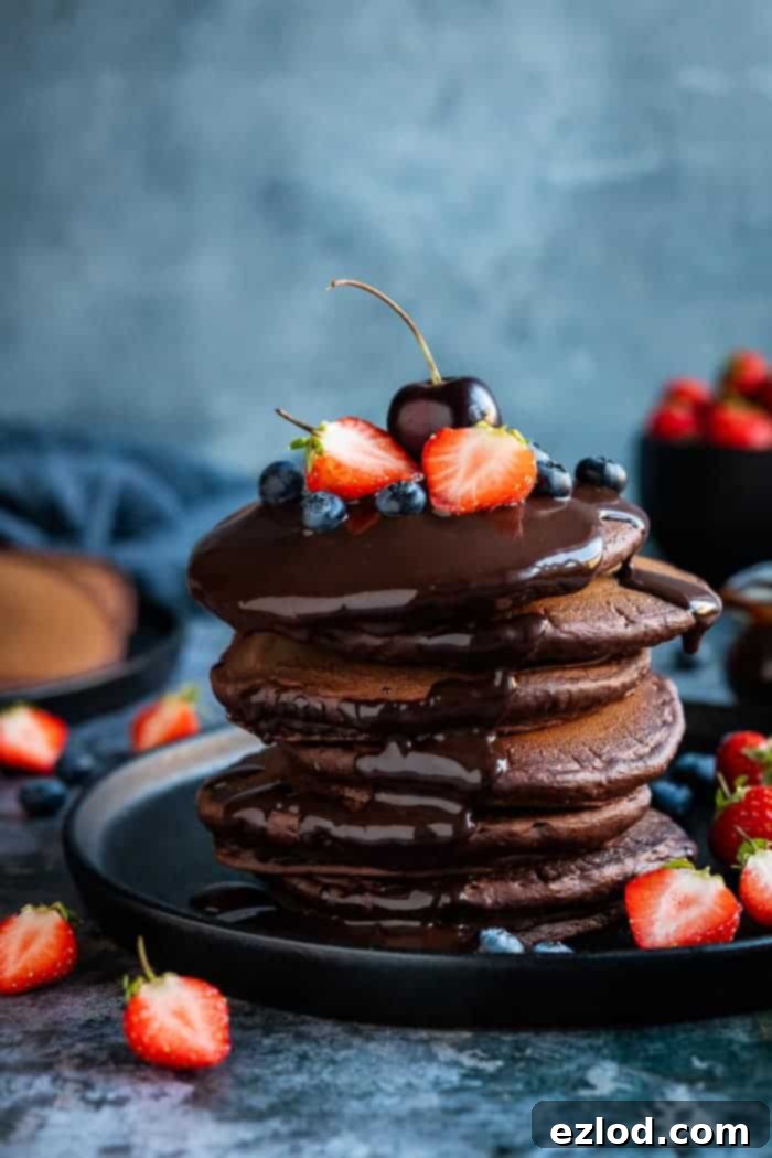 Decadent Vegan Chocolate Fluff Pancakes with Sauce 77 featured 10061