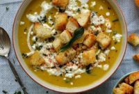 Velvet Pumpkin Soup with Feta, Garlic Croutons, and Fried Sage