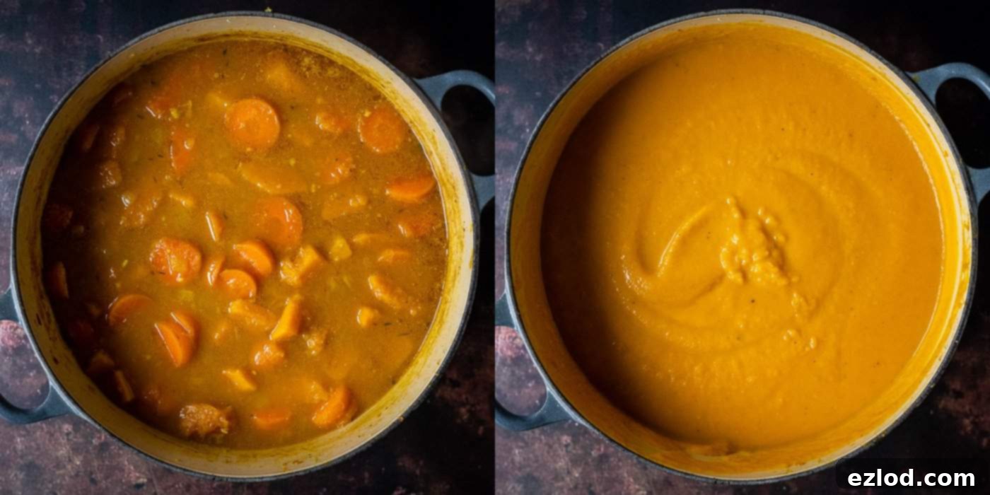Soul-Warming Spiced Carrot and Pumpkin Soup 4 Step-by-step image showing the soup being blended with an immersion blender in the pot to achieve a smooth texture.