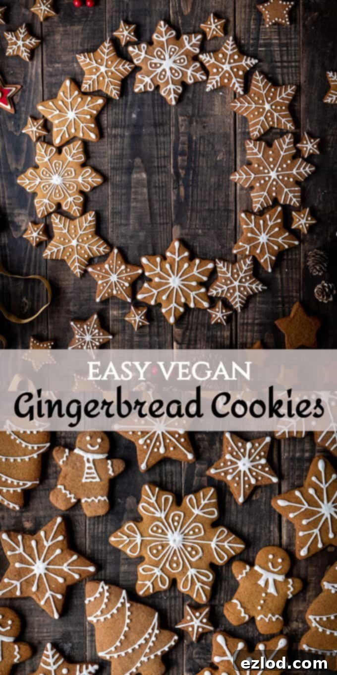 Pin this image! Easy vegan gingerbread cookies, perfect for Christmas, decorating, and gifting. Soft or crunchy, make them your way! #veganbaking #vegangingerbread #gingerbread #eggless #dairyfree #Christmas A festive image of vegan gingerbread cookies, suitable for Pinterest sharing.